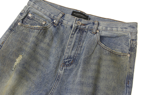 DIRTY WASH RIPPED JEANS